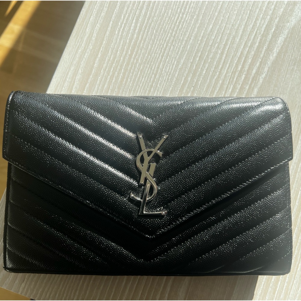 YSL crossbody/clutch. Never used.